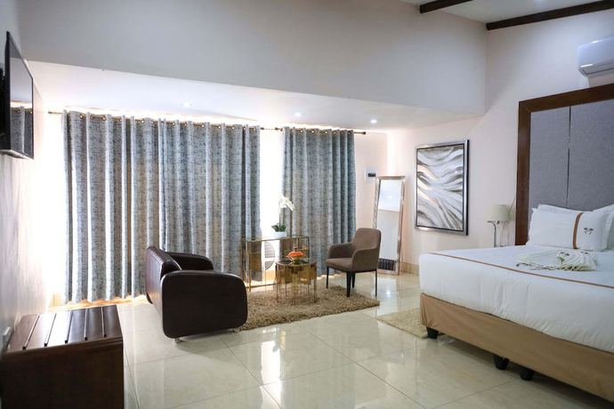 Imagen de la habitación del Hotel the distinction boutique hotel. Foto 8