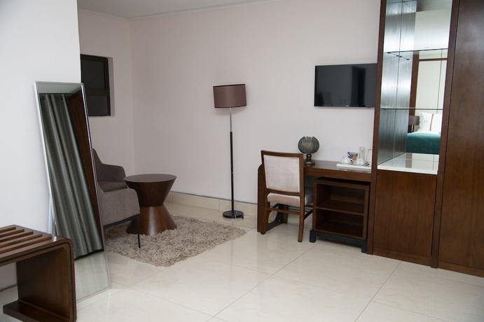 Imagen de la habitación del Hotel the distinction boutique hotel. Foto 11