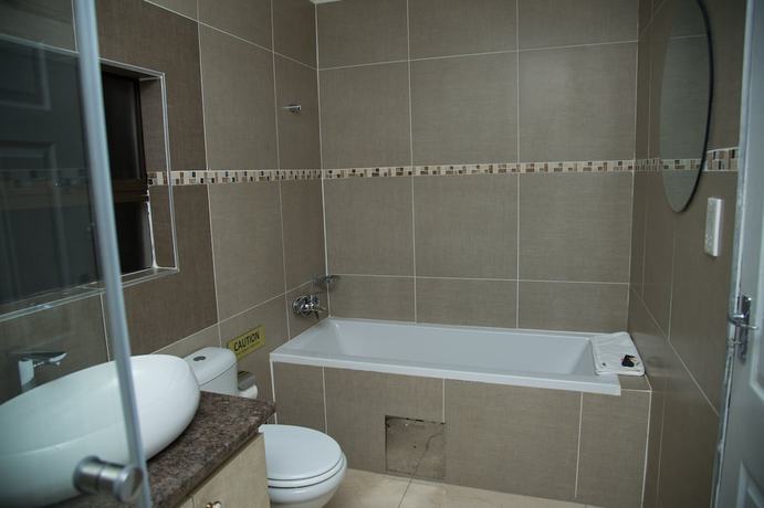 Imagen de la habitación del Hotel the distinction boutique hotel. Foto 12