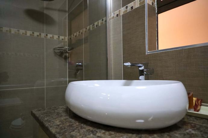 Imagen de la habitación del Hotel the distinction boutique hotel. Foto 16