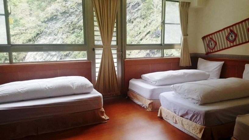 Imagen de la habitación del Hotel tienhsiang youth activity center. Foto 5