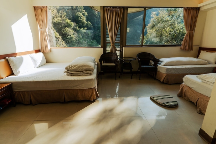 Imagen de la habitación del Hotel tienhsiang youth activity center. Foto 11