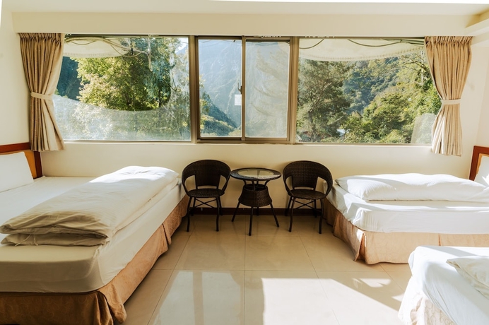 Imagen de la habitación del Hotel tienhsiang youth activity center. Foto 14
