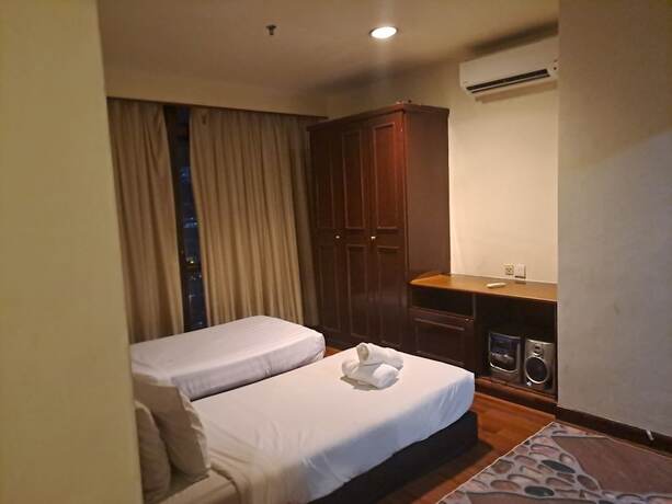 Imagen de la habitación del Hotel tourism Service Suites At Times Square. Foto 6