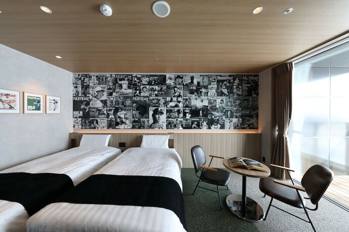 Imagen de la habitación del Hotel tower eleven hotel. Foto 11