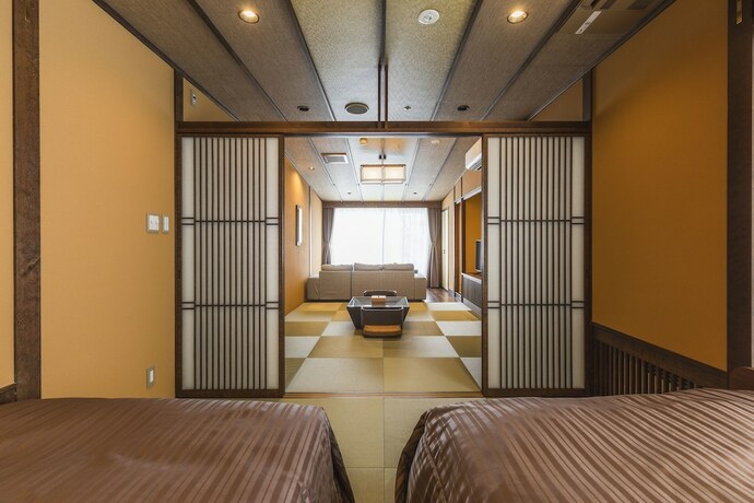 Imagen de la habitación del Hotel tsutaonsen. Foto 16