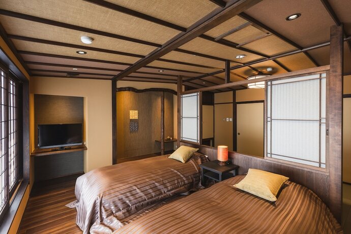 Imagen de la habitación del Hotel tsutaonsen. Foto 19