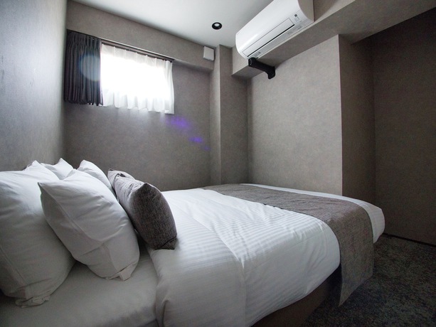 Imagen de la habitación del Hotel ulu Tokyo. Foto 8
