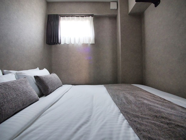 Imagen de la habitación del Hotel ulu Tokyo. Foto 13