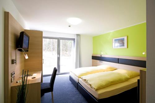 Imagen de la habitación del Hotel und Kongresszentrum Wanderath. Foto 6