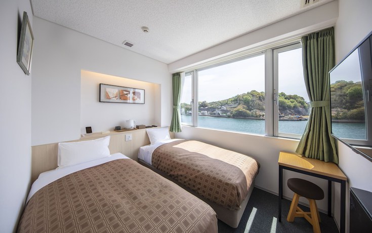 Imagen de la habitación del Hotel urashima INN GANGI. Foto 4