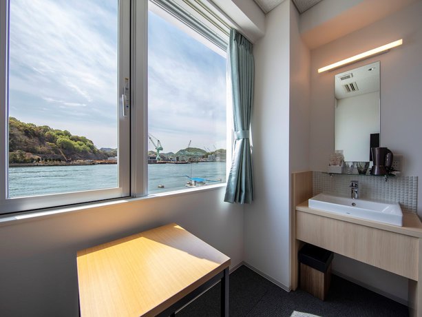 Imagen de la habitación del Hotel urashima INN GANGI. Foto 7