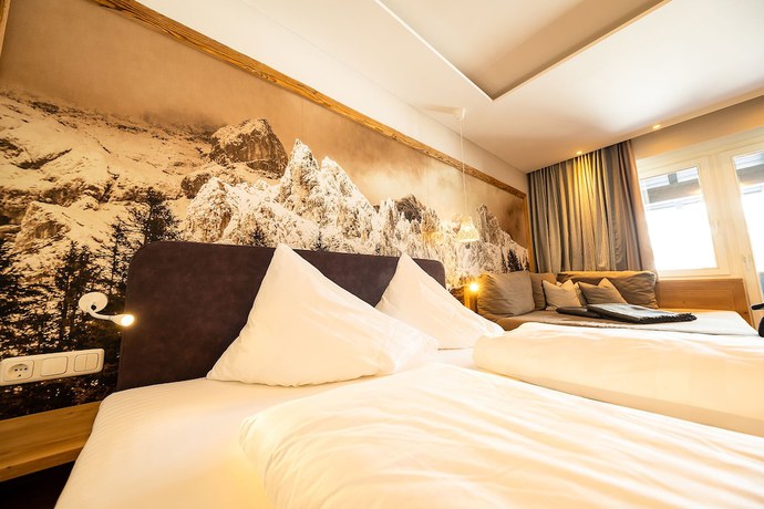 Imagen de la habitación del Hotel &uuml;bergossene Alm Resort. Foto 10
