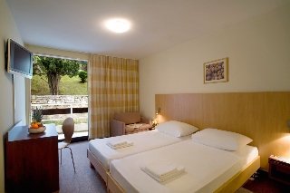 Imagen de la habitación del Hotel valamar collection girandella resort [ex. girandella tourist village]. Foto 6