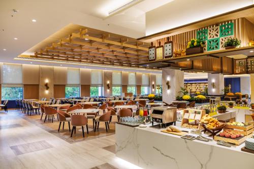 Imagen del bar/restaurante del Hotel voco Chiayi, an IHG. Foto 4