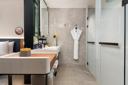 Imagen de la habitación del Hotel voco Jincheng Danhe, an IHG. Foto 11