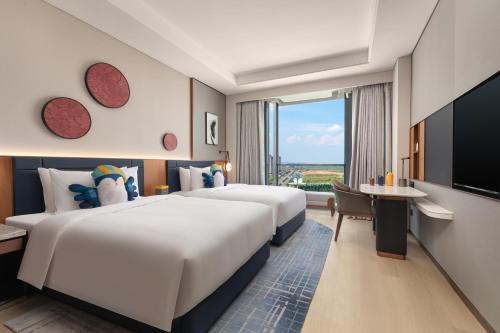 Imagen de la habitación del Hotel voco Jincheng Danhe, an IHG. Foto 18