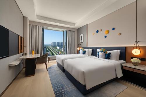 Imagen de la habitación del Hotel voco Jincheng Danhe, an IHG. Foto 19