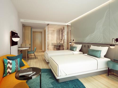 Imagen de la habitación del Hotel voco Ma Belle Danang. Foto 7