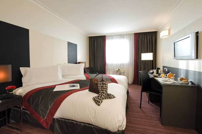 Imagen de la habitación del Hotel voco Paris Montparnasse. Foto 6