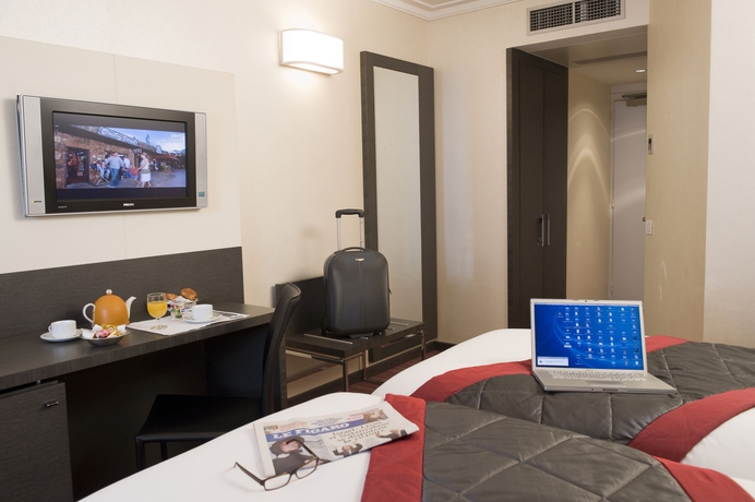 Imagen de la habitación del Hotel voco Paris Montparnasse. Foto 8