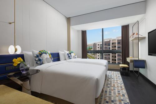 Imagen de la habitación del Hotel voco Suites Shanghai Hongqiao CBD, an IHG. Foto 15