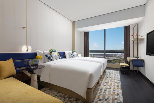 Imagen general del Hotel voco Suites Shanghai Hongqiao CBD, an IHG. Foto 3