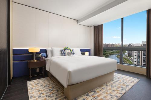 Imagen de la habitación del Hotel voco Suites Shanghai Hongqiao CBD, an IHG. Foto 19