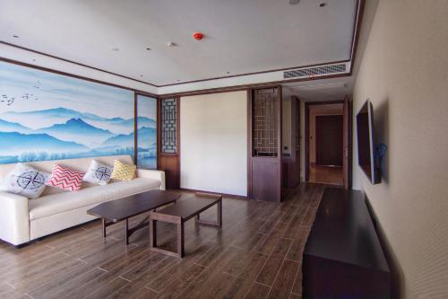 Imagen de la habitación del Hotel wo ge yi shu &bull;hong cun shui mo li hotel. Foto 6