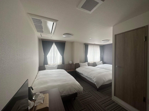 Imagen de la habitación del Hotel world asahi hotel. Foto 12