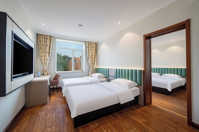 Imagen de la habitación del Hotel world hotel qing dao zhan qiao. Foto 8