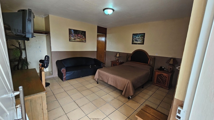 Imagen de la habitación del Hotel y Caba&ntilde;as Manolo. Foto 5