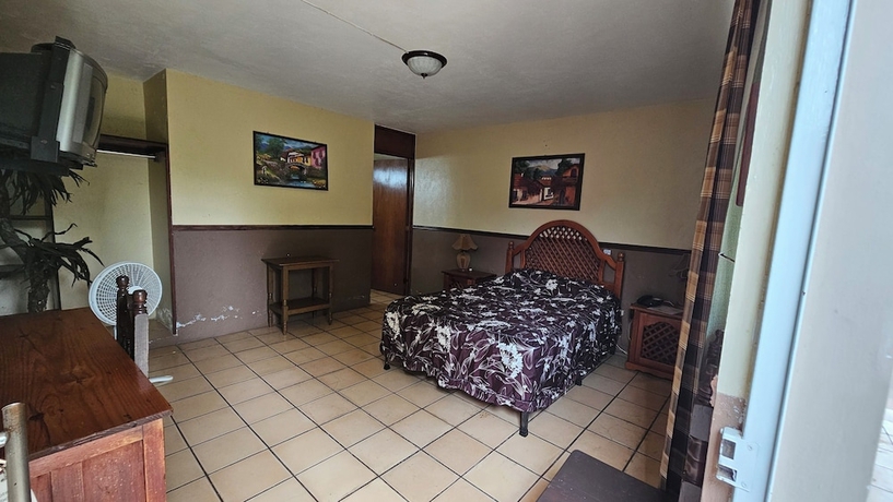 Imagen de la habitación del Hotel y Caba&ntilde;as Manolo. Foto 6