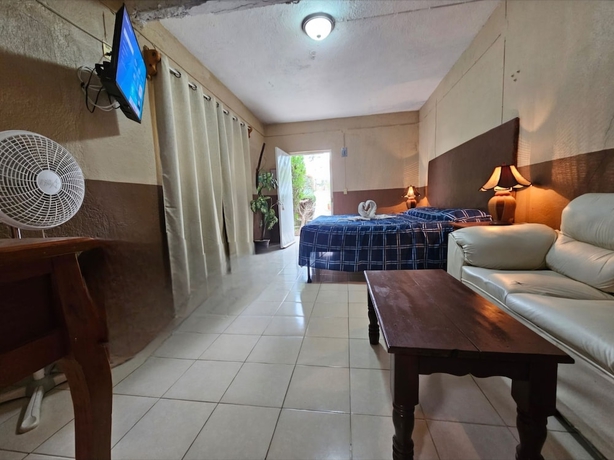 Imagen de la habitación del Hotel y Caba&ntilde;as Manolo. Foto 9