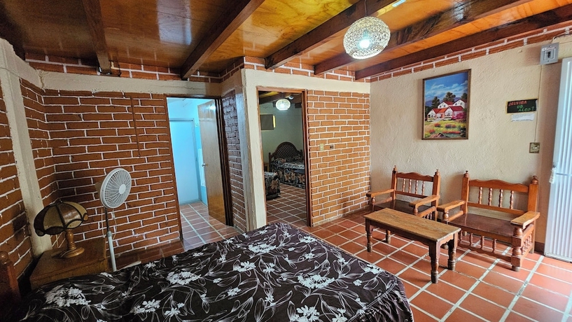 Imagen de la habitación del Hotel y Caba&ntilde;as Manolo. Foto 11