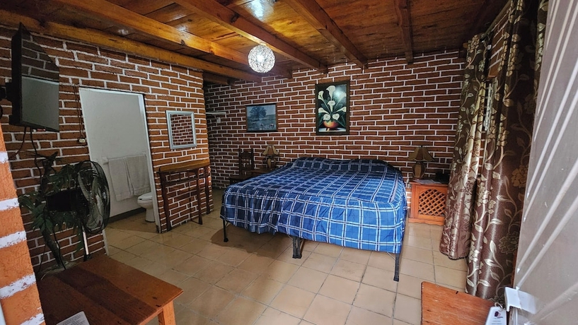 Imagen de la habitación del Hotel y Caba&ntilde;as Manolo. Foto 12