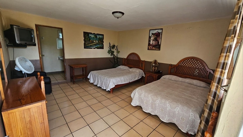 Imagen de la habitación del Hotel y Caba&ntilde;as Manolo. Foto 13