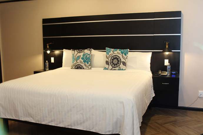 Imagen de la habitación del Hotel y Centro de Convenciones Cacaxtla. Foto 10