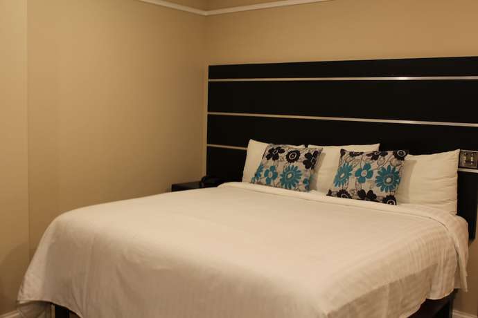 Imagen de la habitación del Hotel y Centro de Convenciones Cacaxtla. Foto 18