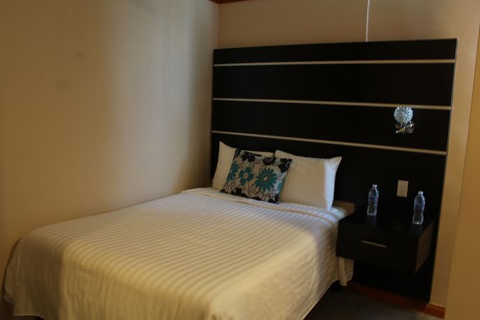 Imagen de la habitación del Hotel y Centro de Convenciones Cacaxtla. Foto 20