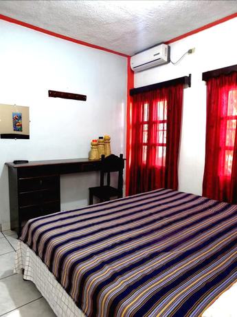 Imagen de la habitación del Hotel y Hostal Yaxkin Copan. Foto 7