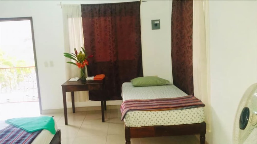 Imagen de la habitación del Hotel y Hostal Yaxkin Copan. Foto 18