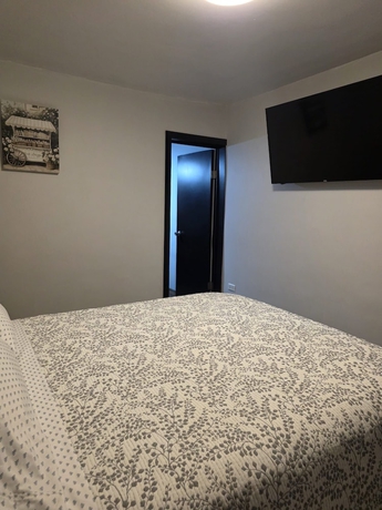 Imagen de la habitación del Hotel y Suites Panda. Foto 3