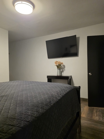 Imagen de la habitación del Hotel y Suites Panda. Foto 4