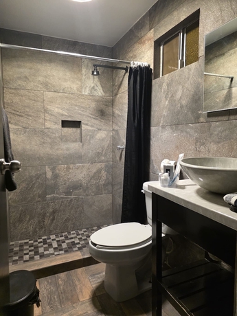 Imagen de la habitación del Hotel y Suites Panda. Foto 8