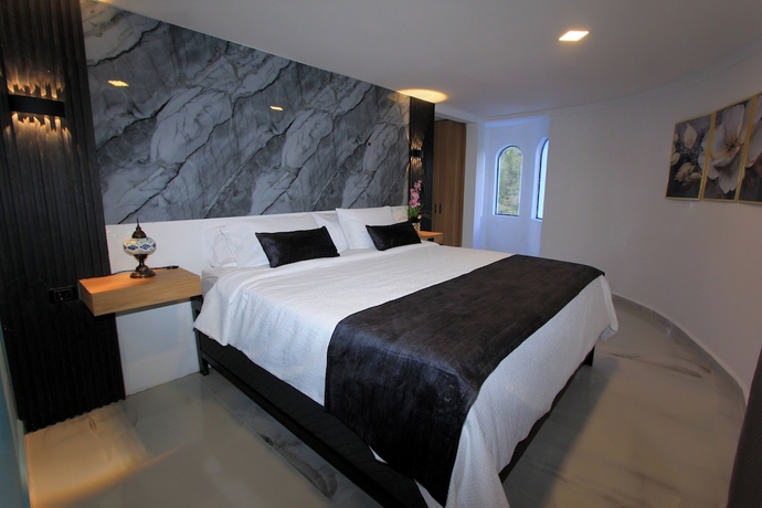 Imagen de la habitación del Hotel y Termales Castillo del Lago. Foto 12
