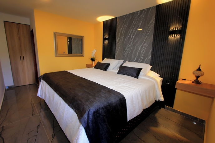 Imagen de la habitación del Hotel y Termales Castillo del Lago. Foto 14
