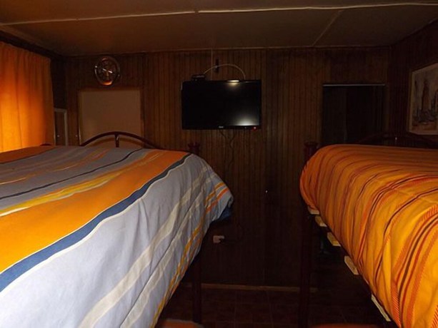 Imagen de la habitación del Hotel y Turismo Amigos. Foto 12