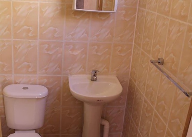 Imagen de la habitación del Hotel y Turismo Amigos. Foto 13