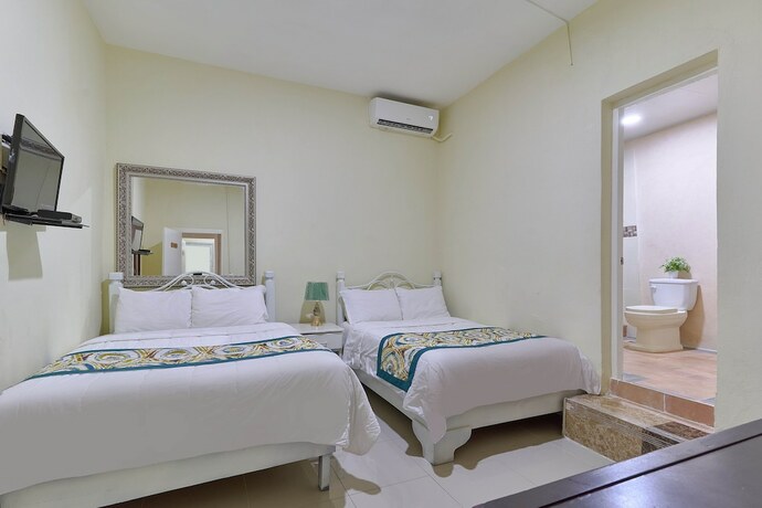 Imagen de la habitación del Hotel y Villas Salamar. Foto 11